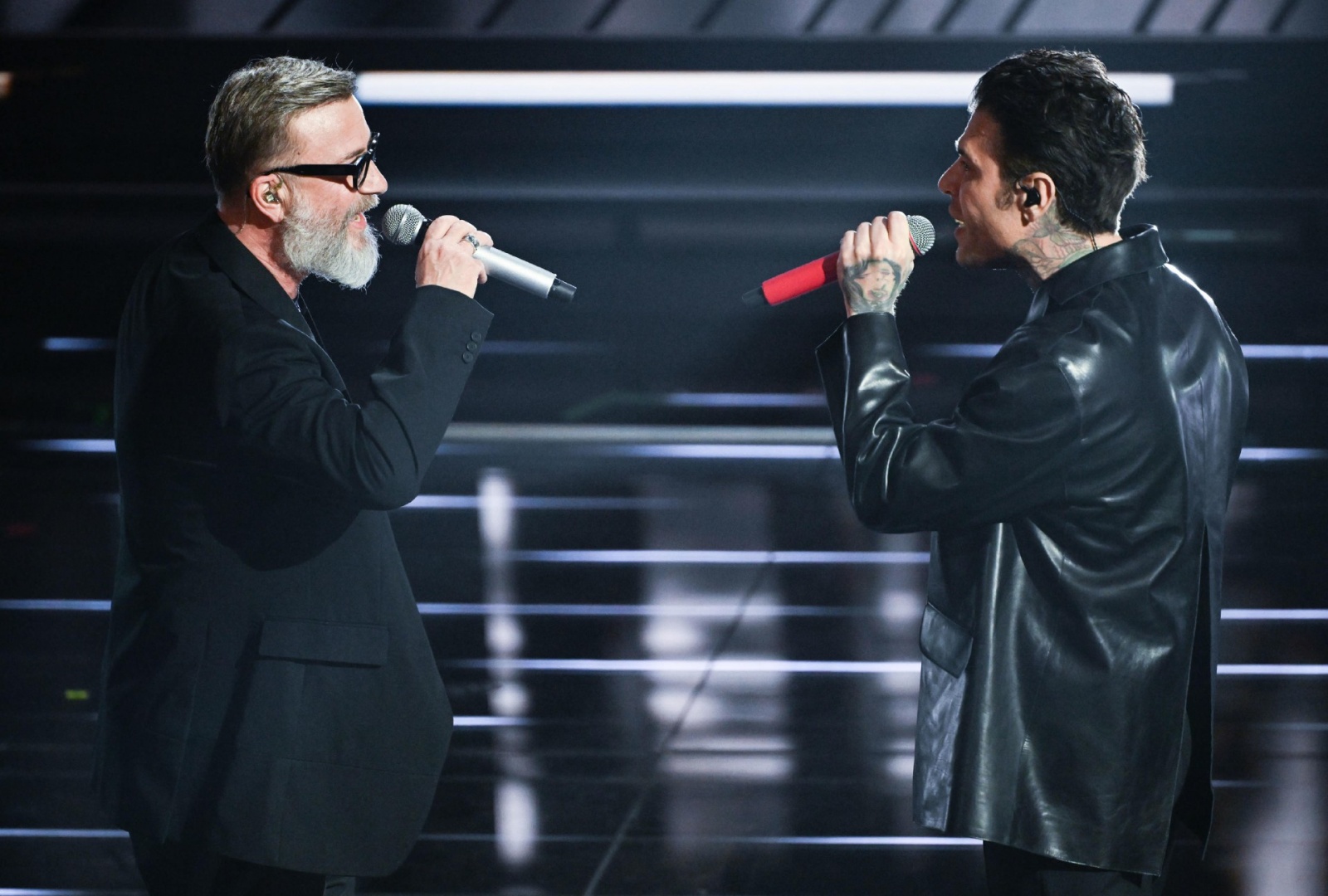 Italian singers Fedez and Marco Masini perform on stage at the Ariston theatre during the 76th edition of the Sanremo Italian Song Festival, in Sanremo, Italy, 25 February 2026. The music festival will run from 24 to 28 February 2026. ANSA/RICCARDO ANTIMI