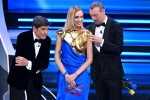 (L-R) Italian singer and Sanremo Festival co-host Gianni Morandi, Italian fashion blogger, businesswoman and model Chiara Ferragni and Sanremo Festival host and artistic director Amadeus on stage at the Ariston theatre during the 73rd Sanremo Italian Song
