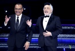 Sanremo Festival host and artistic director Carlo Conti (L) and Italian actor Nino Frassica (R) on stage at the Ariston theatre during the 75th edition of the Sanremo Italian Song Festival, in Sanremo, Italy, 12 February 2025. The music festival will run 