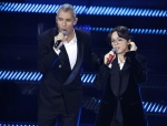 Italian actors Paolo Kessisoglu (L) with his daughter Lunita (R) on stage at the Ariston theatre during the 75th edition of the Sanremo Italian Song Festival, in Sanremo, Italy, 14 February 2025. The music festival will run from 11 to 15 February 2025. AN