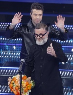 Italian singers Fedez (L) and Marco Masini perform on stage at the Ariston theatre during the 75th edition of the Sanremo Italian Song Festival, in Sanremo, Italy, 14 February 2025. The music festival will run from 11 to 15 February 2025. ANSA/FABIO FRUST